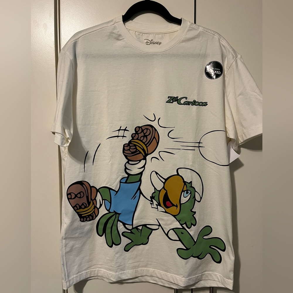 Disney Men's Cream Graphic Tee with Green and Blue Accents Relaxed Fit